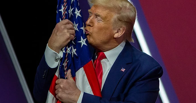 b22ae3001f142a69a0b671243386797f15-29-president-trump-american-flag-cpac-20.rsocial.w1200