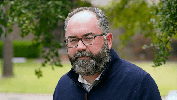 Middle aged man with glasses