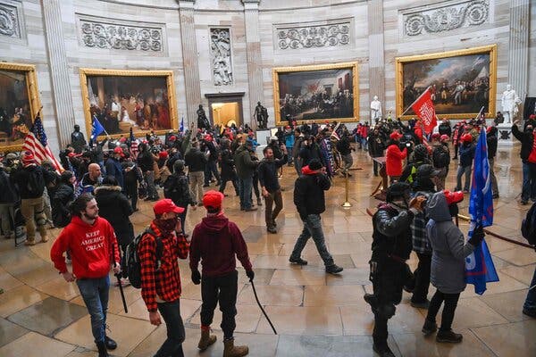 The mob inside the Capitol on Wednesday. Some of those in the crowd seemed to show a bewildered wonder at what they were seeing in front of them.