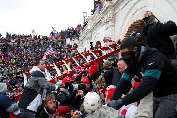 Rioters clashed with the police on Wednesday.